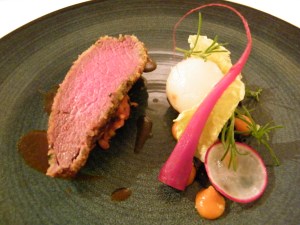 Herb-crusted loin of New Zealand venison, potato, pearl barley, heirloom carrot & cocoa